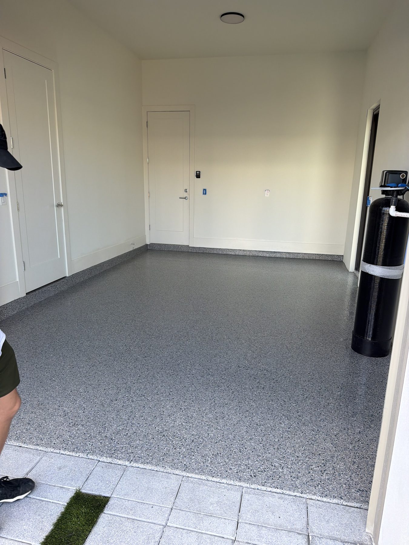 Interior utility room with flake epoxy floor